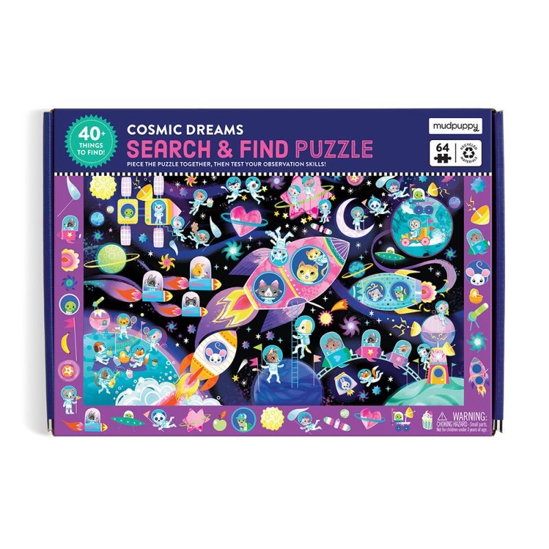 Dziecko układa puzzle obserwacyjne z motywem kosmosu