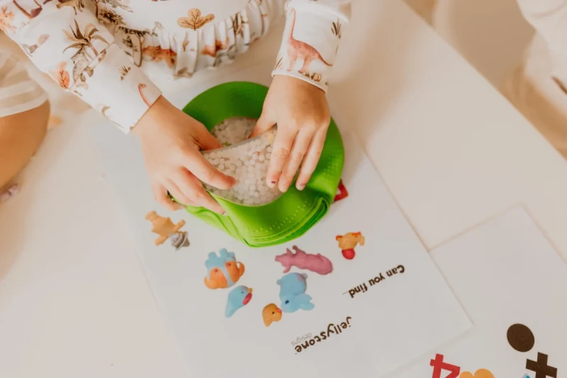 Sensoryczny dysk A-Ku-Ku! Peekaboo Farma Zielony 18 m+ | Jellystone Designs