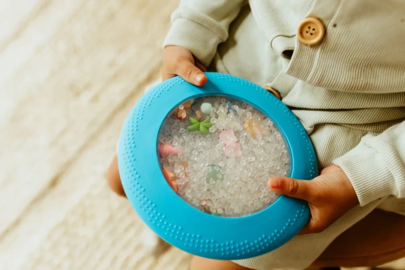 Dysk sensoryczny Jellystone z figurkami plażowymi dla maluchów