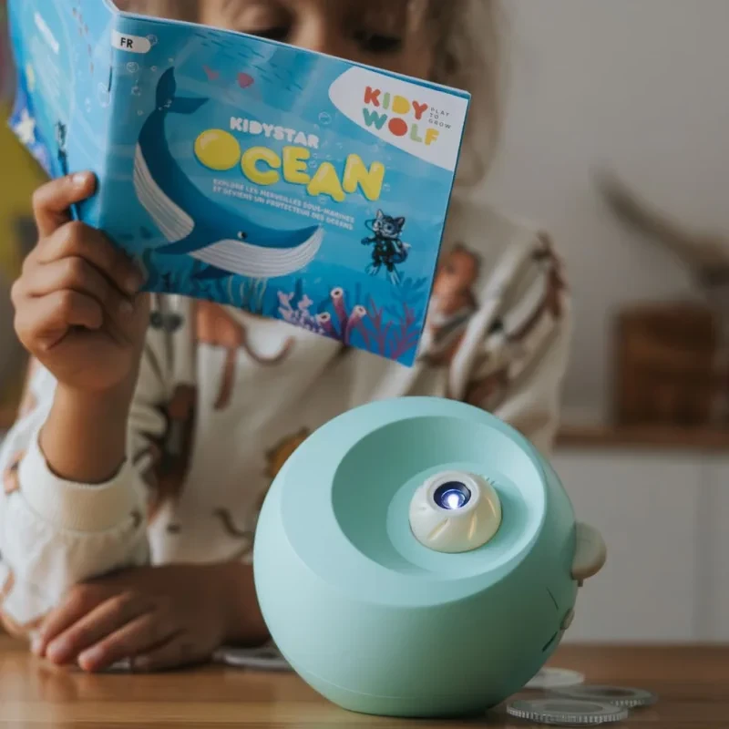 Projektor oceanów z wymiennymi dyskami i muzyką dla dzieci
