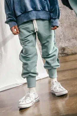 Miętowe spodnie dziecięce booso SHAPE MINT PANTS